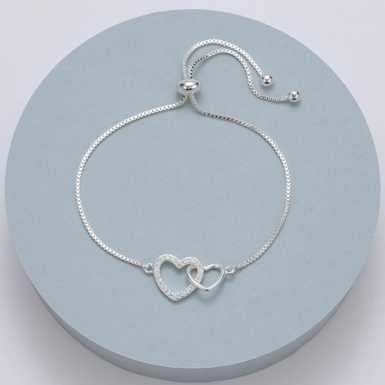 Gracee Jewellery Interlocking Pave Crystal & Shiny Silver Hearts Slider Bracelet - Silver