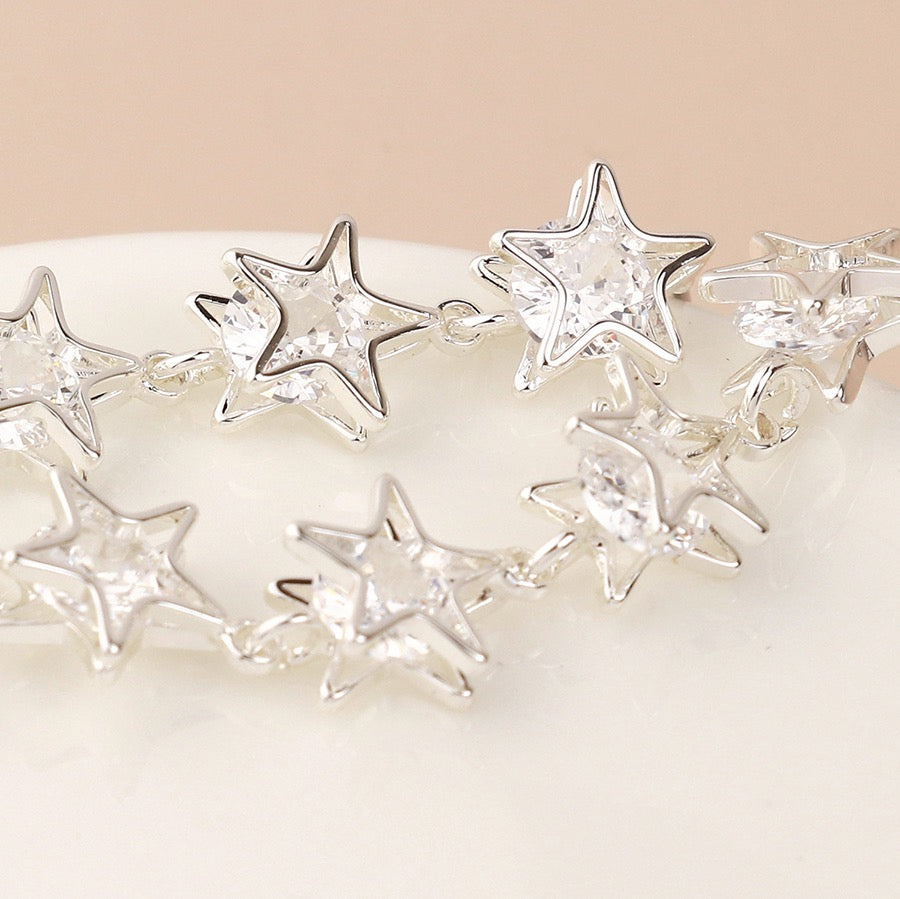 POM Silver Plated Clear Crystal Centred Multi Star Dangly Earrings