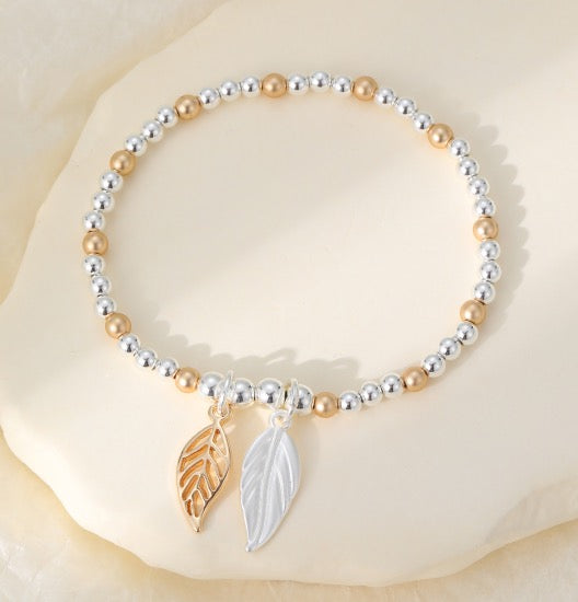 Gracee Jewellery - Silver &amp; Gold Double Leaf Charms - Stretch Bracelet