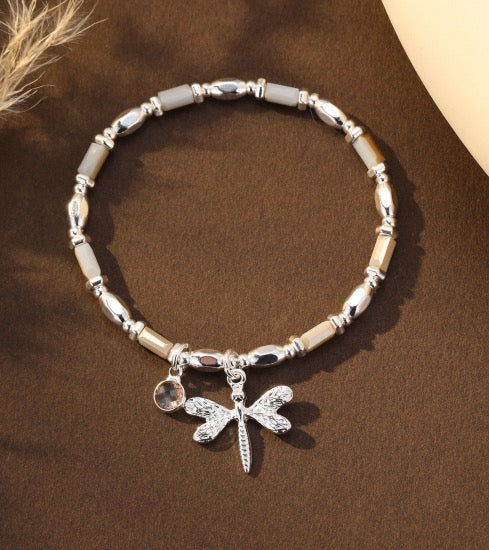 Gracee Jewellery - Neutral Tone Crystals &amp; Silver Dragonfly Charm - Stretch Beaded Bracelet