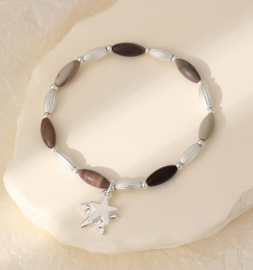 Gracee Jewellery - Silver &amp;  Natural Tone Ovals &amp; Double Stars Charm - Stretch Bracelet