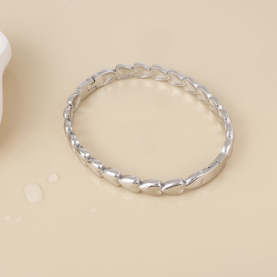 POM WATERPROOF - Unity Stainless Steel Hearts Bangle - Silver