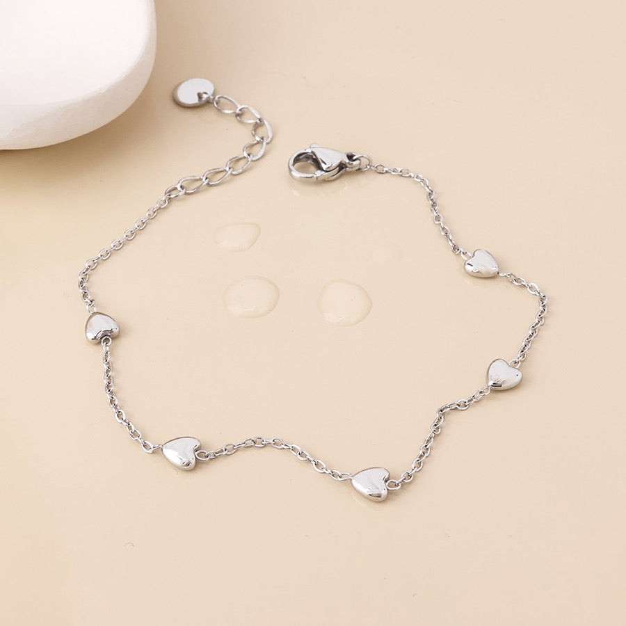 POM WATERPROOF - Whisper Stainless Steel Tiny Hearts Station Chain Bracelet - Silver