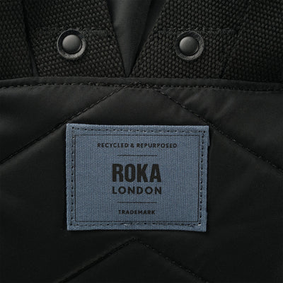 Roka Canfield B SMALL Backpack-Recycled Nylon - Creative Waste Black Edition - Black/Airforce Blue