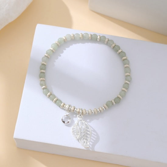 Gracee Jewellery Pale Sage Green Beaded Bracelet with Silver Leaf & Diamante Charms