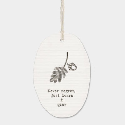 East of India Porcelain Oval Hanger -Never Regret